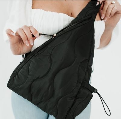 Striding Through Philly Puffer Sling