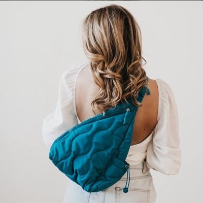 Striding Through Philly Puffer Sling