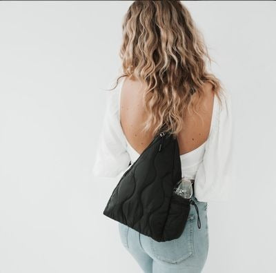 Striding Through Philly Puffer Sling